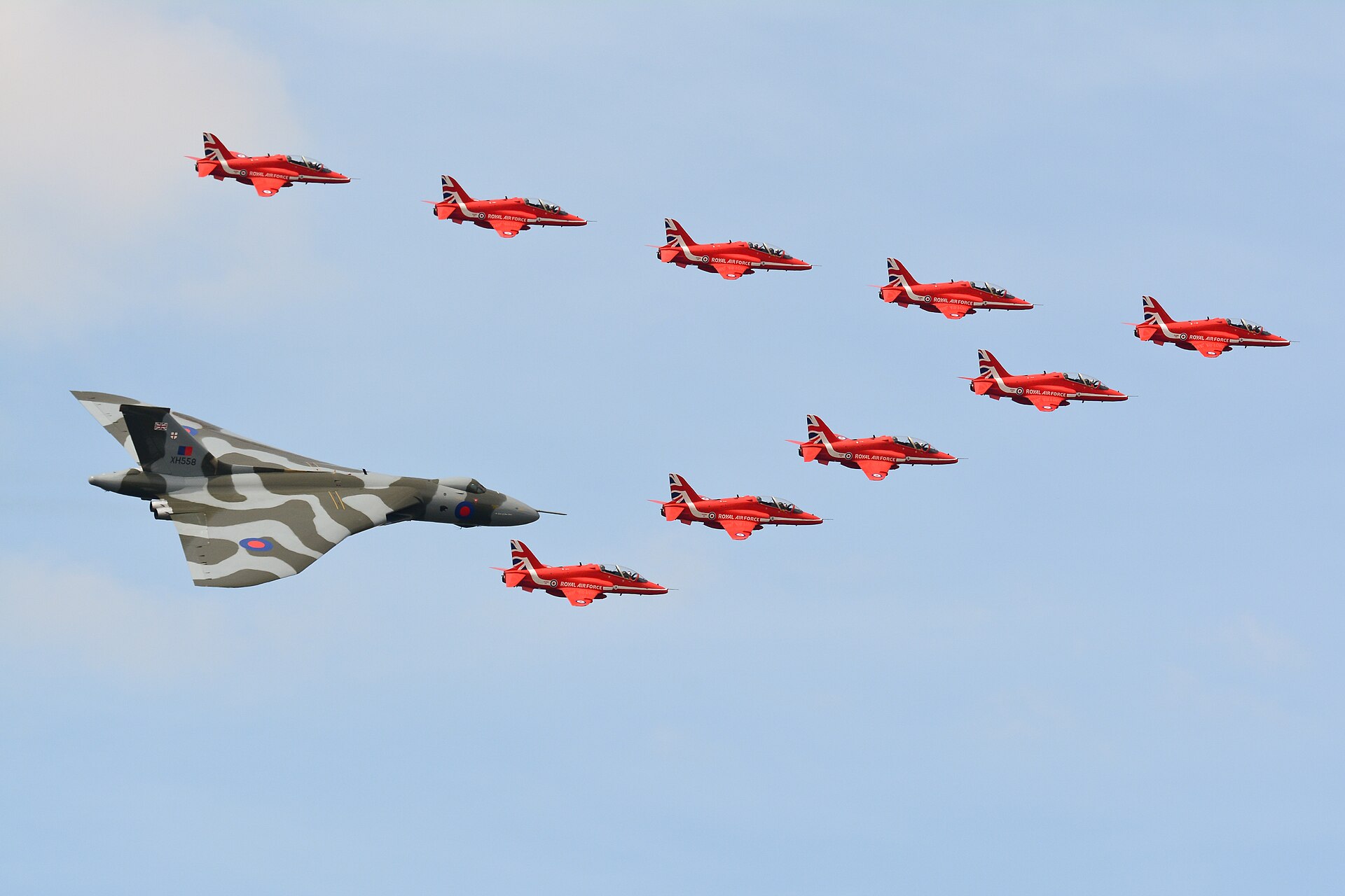XH558 with the Red Arrows
